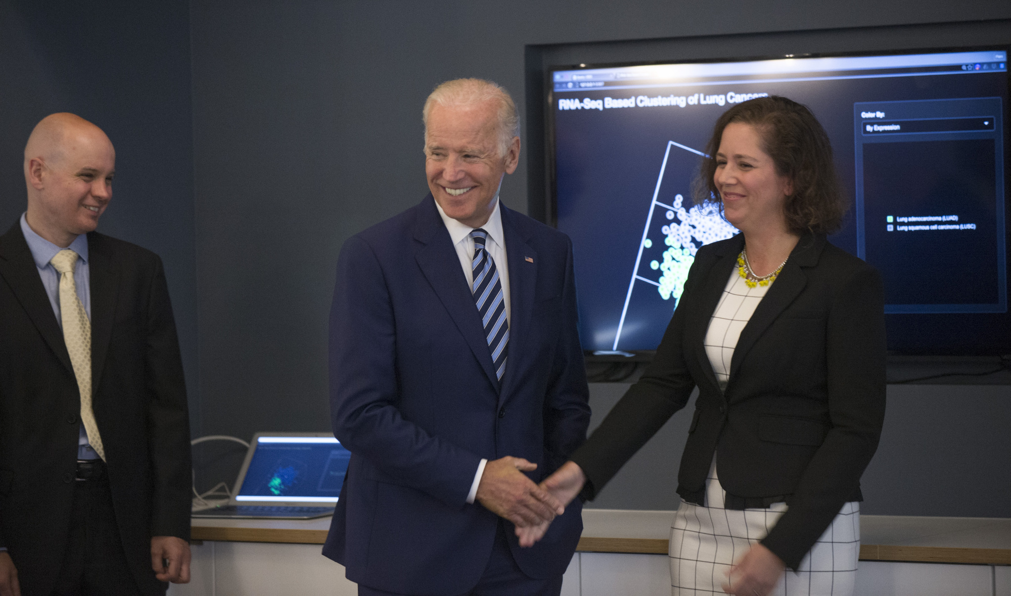 Vice President Joe Biden talks with Barbara Stranger, PhD and Piers Nash, PhD (left) during the GDC tour. (Photo by Robert Kozloff; source: Genomic Data Commons at UChicago heralds new era of data sharing for cancer research)